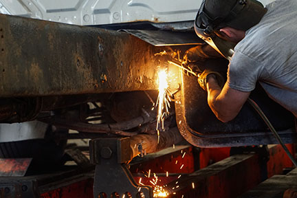 Mechanic Welding and Performing Heavy Truck Maintenance Syracuse NY